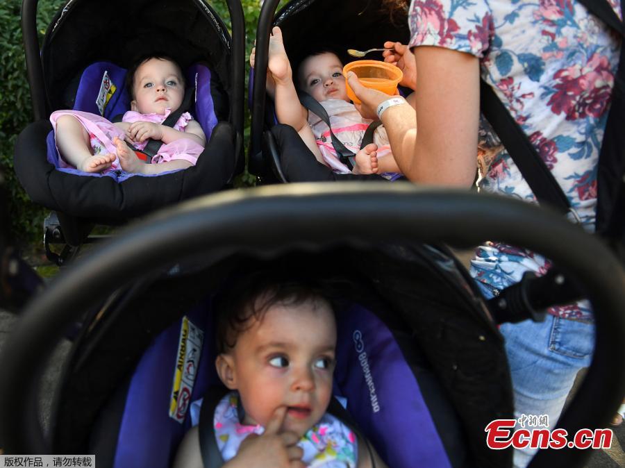 Twins and triplets children are seen, as they set the new record of twins, at the Festival Of Twins in Kiev, Ukraine, Aug. 11, 2018. Representatives of the Ukrainian National Register of Records registered the new record at 200 pairs of twins and triplets, who gathered at the same time in the same place. (Photo/Agencies)