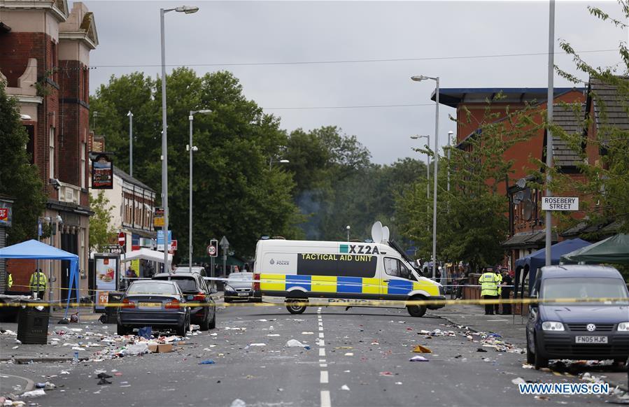Photo taken on Aug. 12, 2018 shows the scene of the mass shooting occurring in the Moss Side area, Manchester, Britain. A mass shooting in the British city of Manchester wounded 10 people Sunday morning, local authorities said. (Xinhua/Ed Sykes)