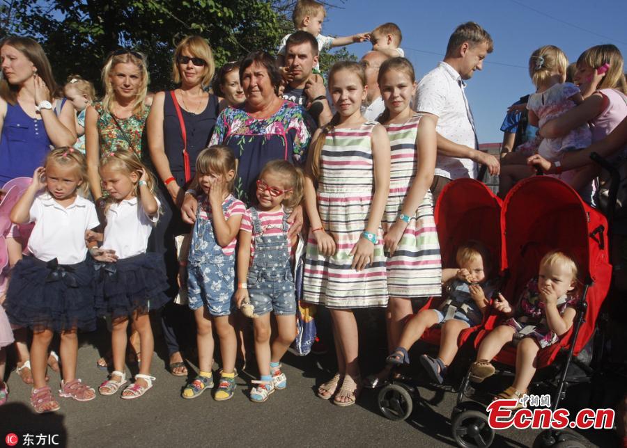 <?php echo strip_tags(addslashes(Twins and triplets children are seen, as they set the new record of twins, at the Festival Of Twins in Kiev, Ukraine, Aug. 11, 2018. Representatives of the Ukrainian National Register of Records registered the new record at 200 pairs of twins and triplets, who gathered at the same time in the same place. (Photo/IC))) ?>