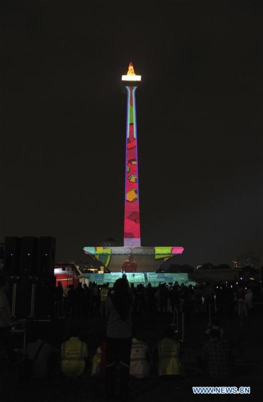 <?php echo strip_tags(addslashes(A video mapping work is projected on the facade of the National Monument also known as Monas to welcome the Asian Games in Jakarta, Indonesia, Aug. 13, 2018. (Xinhua/Zulkarnain))) ?>