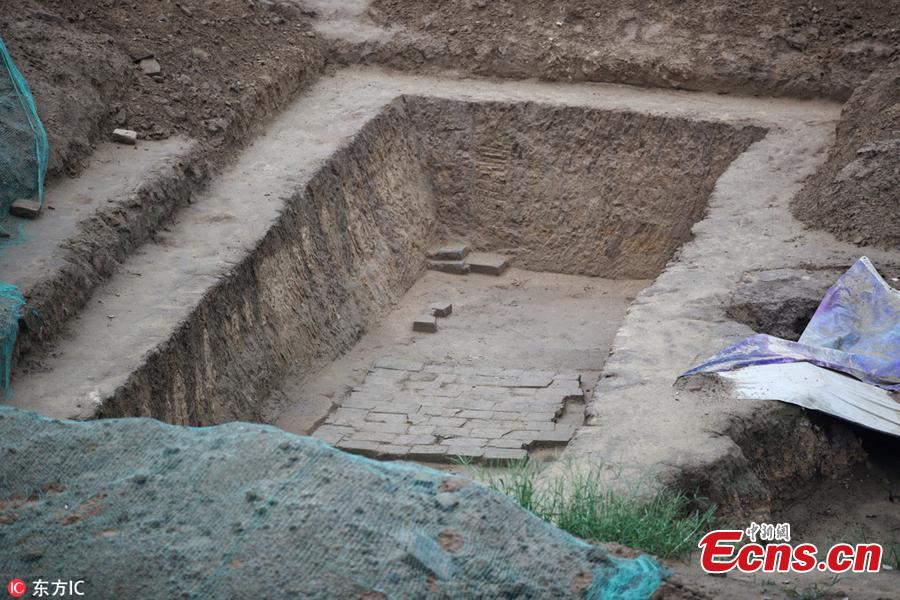 Ancient tomb clusters consisting of about 300 tombs have been found near the Beijing Olympic Sports Center in Beijing, China. The 300 tombs, discovered at a construction site, were  presumably built around the Qing Dynasty (1644-1911), according to local cultural relics department. (Photo/IC)