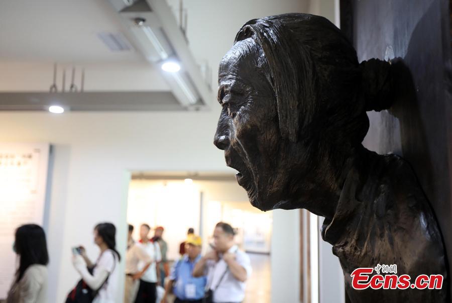 People visit a museum founded on the former site of a \
