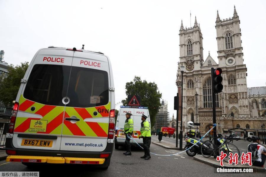 Police officers stand at a cordon after a car crashed outside the Houses of Parliament in Westminster, London, Britain, Aug. 14, 2018. A man deliberately drove a car into London pedestrians and cyclists on Tuesday before ramming it into barriers outside Britain’s parliament in what police said appeared to be the second terrorist attack at the building in just under 18 months. (Photo/Agencies)
