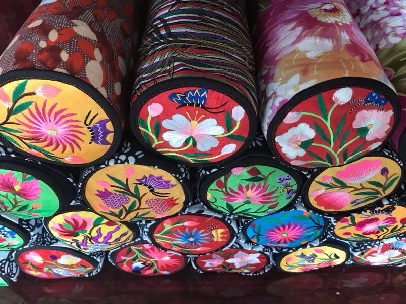 The embroidered pillows have become one of the popular tourist items in Longnan of Gansu Province.  (Photo provided to chinadaily.com.cn)