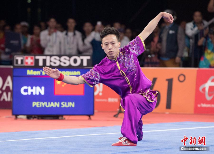 Sun Peiyuan of China competes during the Men\'s Changquan final at the 18th Asian Games in Jakarta, Indonesia Aug. 19, 2018.  (Photo/China News Service)