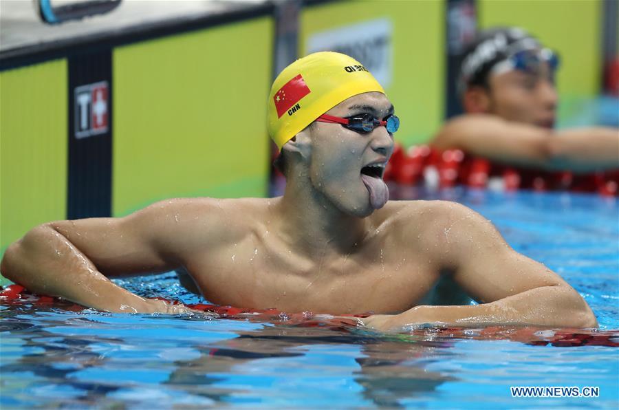 Xu Jiayu of China celebrates after winning the gold medal of men\'s 100m backstroke final in the 18th Asian Games in Jakarta, Indonesia, Aug. 19, 2018. (Photo/Xinhua)

Xu Jiayu of China wins gold medal of men\'s 100m backstroke final at 18th Asian Games Sunday.