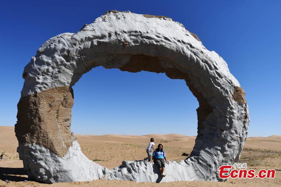 Twenty-six sculptures collected from around the world are on show in a desert in Minqin County, Northwest China’s Gansu Province, Aug. 22, 2018. The sculptures have been made from varying materials, including stainless steel, cast iron, stone and cement, and they reveal the ever-present nature of sand and its control in the county. (Photo: China News Service/Yang Yanmin)