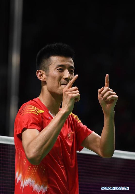 China\'s Chen Long celebrates during the double\'s match of men\'s team final between China and Indonesia at the 18th Asian Games in Jakarta, Indonesia on Aug. 22, 2018. (Xinhua/Li Xiang)