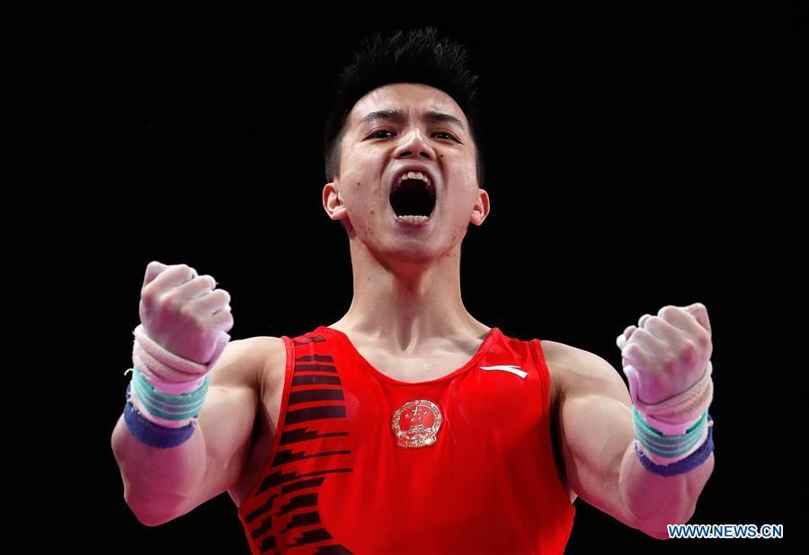 Lin Chaopan of China reacts after the Horizontal Bar competition of Artistic Gymnastics Men\'s Team Final at the Asian Games 2018 in Jakarta, Indonesia on Aug. 22, 2018. (Xinhua/Wang Lili)