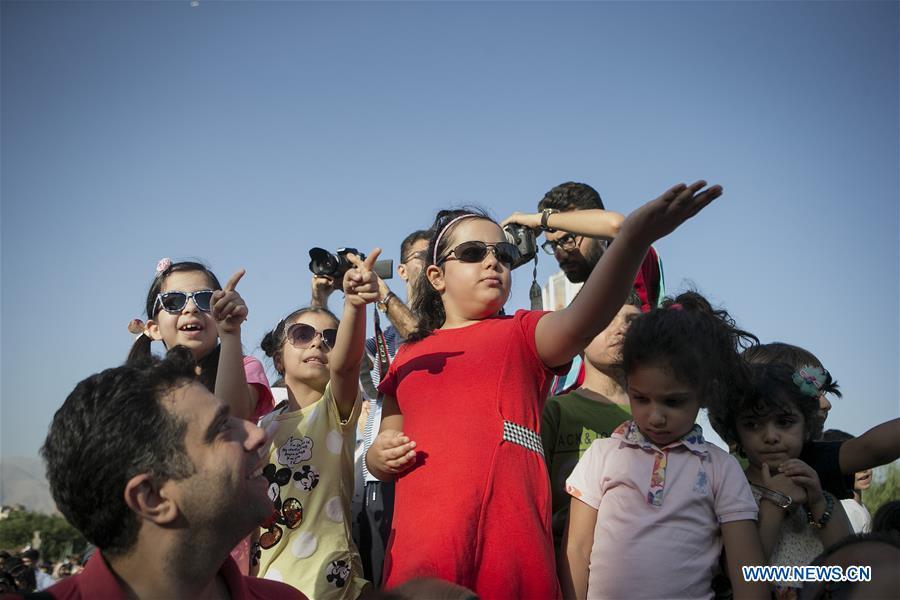 Children watch the puppet parade during the opening ceremony of 17th Tehran International Puppet Theater Festival in Tehran, capital of Iran, on Aug. 22, 2018. The six-day-long festival opened here on Wednesday. (Xinhua/Ahmad Halabisaz)