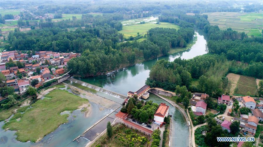 <?php echo strip_tags(addslashes(Aerial photo taken on Aug. 22, 2018 shows a section of Changqu Canal in Xiangyang, central China's Hubei Province. The Changqu Canal has been added to the World Heritage Irrigation Structures list by the International Commission on Irrigation and Drainage (ICID) recently. (Xinhua/Xiong Qi))) ?>