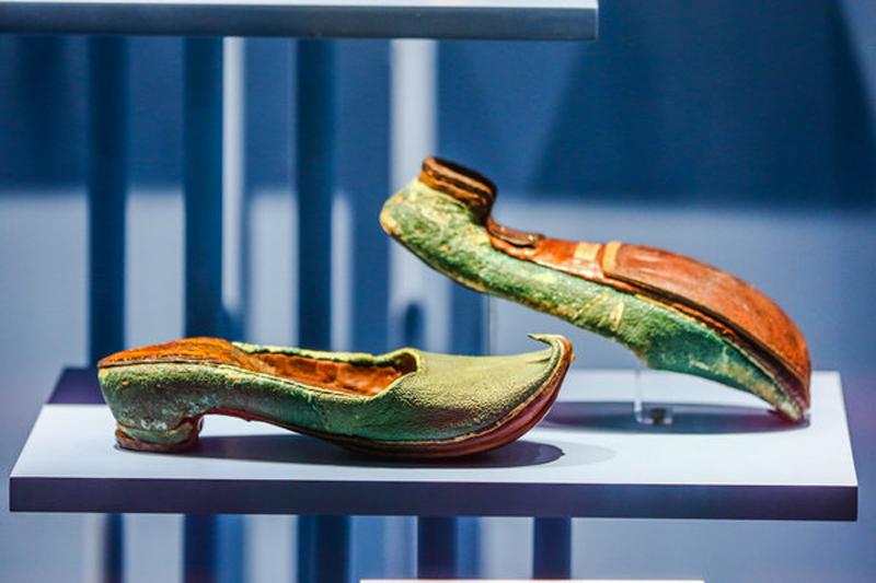 Shoes displayed at the ongoing exhibition. [Photo provided to China Daily]

For the Asia leg of the exhibition, actress and singer Karen Mok has loaned 14 pairs of shoes from her personal collection, which represent important milestones in her life and career.


Savi says though the original collection of the V&A museum holds around 3,000 pairs of shoes she found that there were few gaps in the collection. So, she then searched for more representative pairs from outside the V&A, including the Metropolitan Museum of Art in America.


For the exhibition, the team borrowed a pair of football shoes of David Beckham from the National Football Museum in the British city of Manchester.


She says though she enjoys studying the shoes and is attached to them, there is also the pain of getting rid of some while selecting exhibits.


\