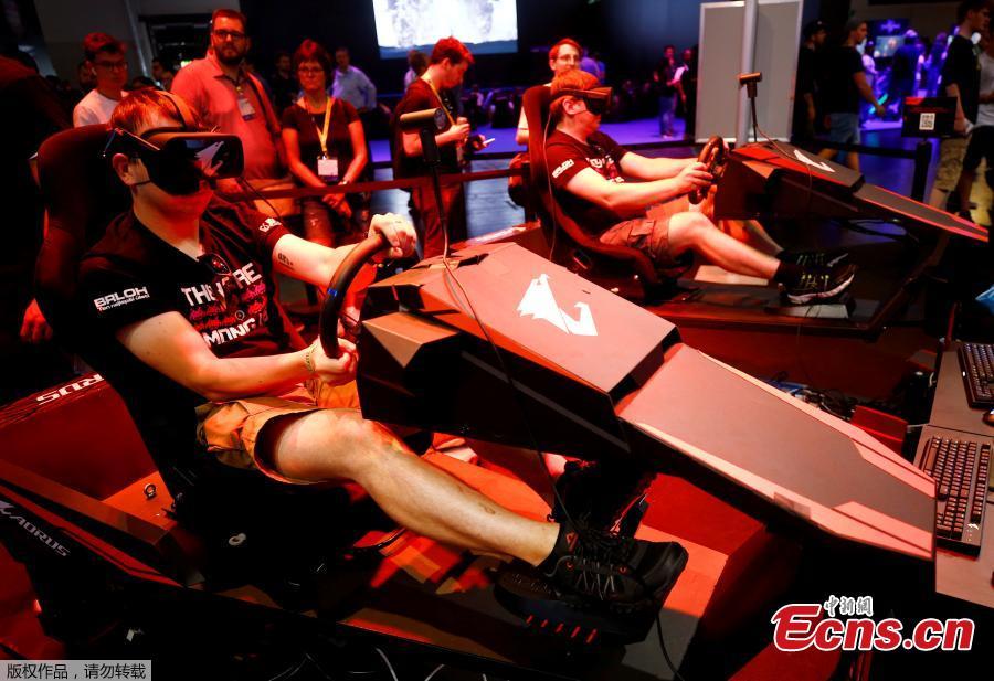 Gamers play during the media day of the world\'s largest computer games fair Gamescom in Cologne, Germany,  August 21, 2018. (Photo/Agencies)