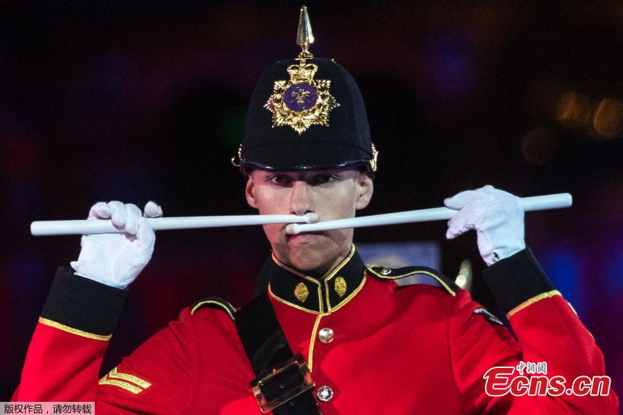 <?php echo strip_tags(addslashes(A member of the Brentwood Imperial Youth Band from Britain performs during a rehearsal of the Spasskaya Tower international military music festival in Red Square, in Moscow, Russia, Aug. 23, 2018. (Photo/Agencies))) ?>