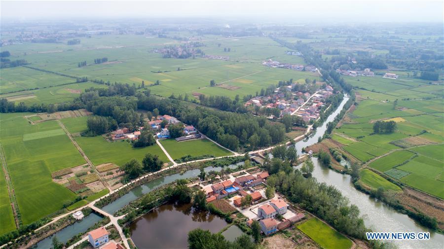 <?php echo strip_tags(addslashes(Aerial photo taken on Aug. 22, 2018 shows a section of Changqu Canal in Xiangyang, central China's Hubei Province. The Changqu Canal has been added to the World Heritage Irrigation Structures list by the International Commission on Irrigation and Drainage (ICID) recently. (Xinhua/Xiong Qi))) ?>
