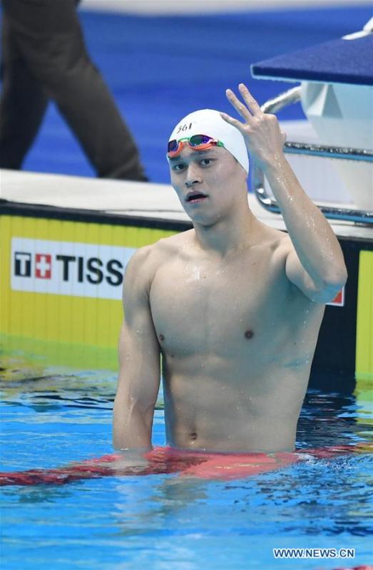 <?php echo strip_tags(addslashes(Sun Yang of China reacts after men's 1500m freestyle final of swimming at the 18th Asian Games in Jakarta, Indonesia, Aug. 24, 2018. Sun won the gold medal. (Xinhua/Yue Yuewei))) ?>