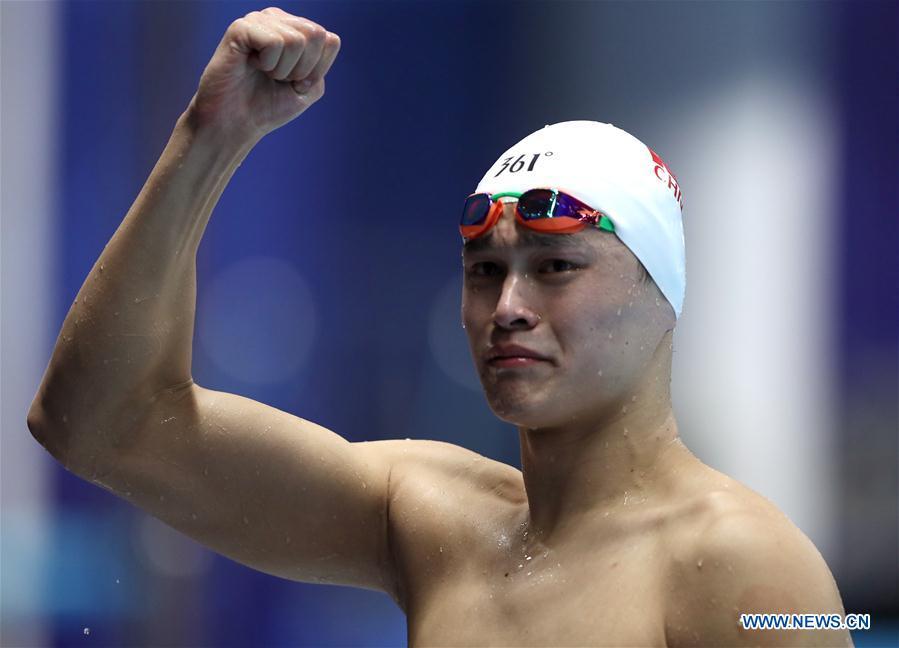 Sun Yang of China celebrates after men\'s 1500m freestyle final of swimming at the 18th Asian Games in Jakarta, Indonesia, Aug. 24, 2018. Sun won the gold medal. (Xinhua/Fei Maohua)