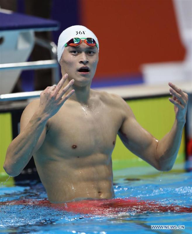 <?php echo strip_tags(addslashes(Sun Yang of China reacts after men's 1500m freestyle final of swimming at the 18th Asian Games in Jakarta, Indonesia, Aug. 24, 2018. Sun won the gold medal. (Xinhua/Fei Maohua))) ?>