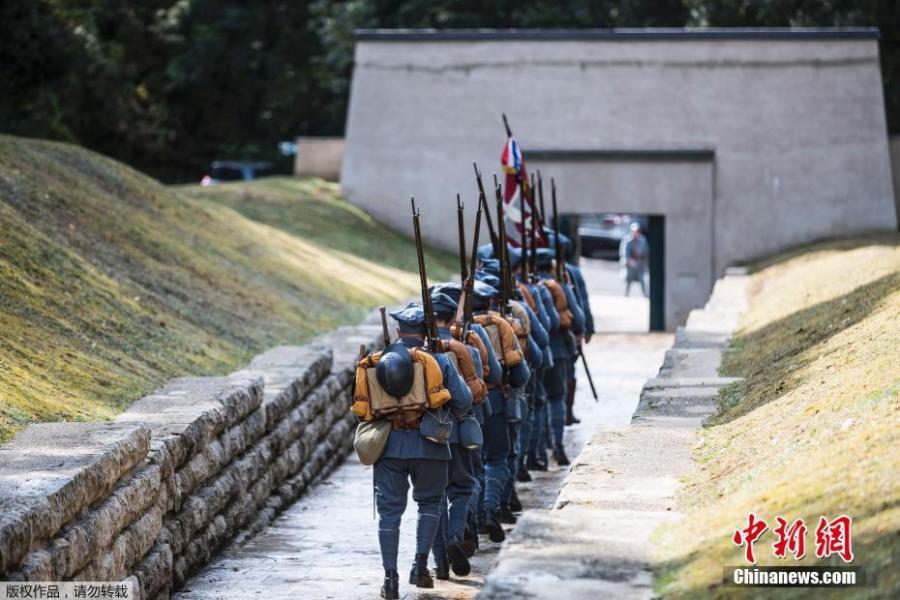 Men dressed in WWI uniforms march during a parade, part of the reconstruction of the WWI battle of Verdun, Aug. 25, 2018, in Verdun, eastern France. Hundreds of volunteers from 18 countries gathered in the French town Verdun as part of a string of events to mark the centenary of the end of World War One, with re-enactors dressed in period soldiers’ uniforms bringing to life a big military encampment in the town. (Photo/Agencies)
