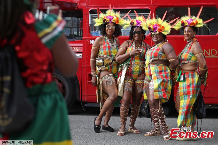 Revelers take part in the Notting Hill Carnival in London, Britain August 27, 2018. The Notting Hill Carnival is a symbol of interracial tolerance which dates back to the 1960s and celebrates the Afro-Caribbean community. (Photo/Agencies)