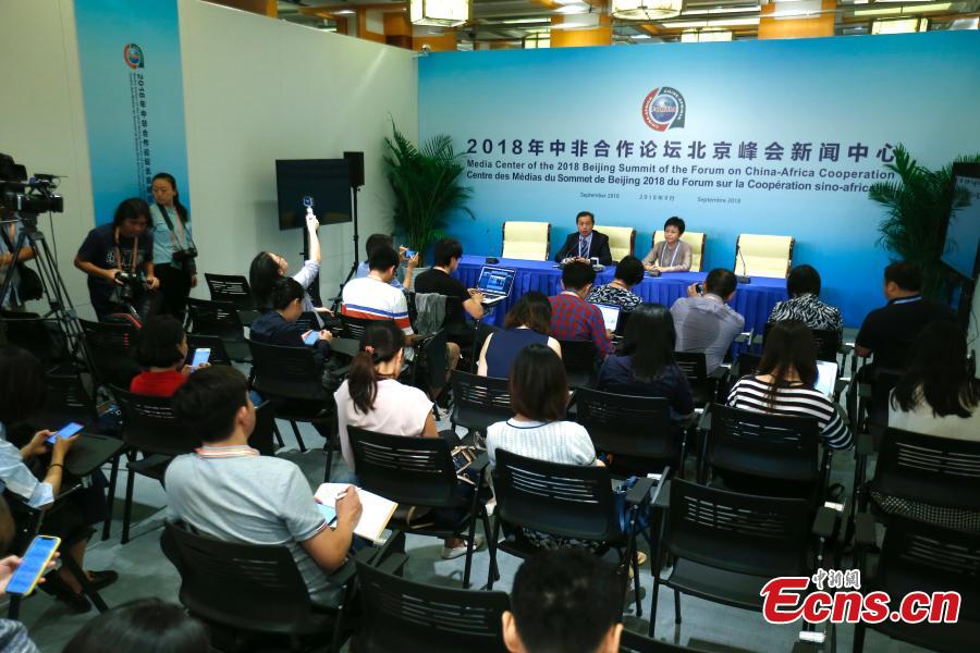 Li Minggang, deputy director of the information department at the Ministry of Foreign Affairs, talks to reporters at the start of trial operation of the media center for the Forum on China-Africa Cooperation (FOCAC) in Beijing, Aug. 29, 2018. Covering about 8,300 square meters, the center has eight functional zones, including an area for press conferences and cultural display. The FOCAC was founded in 2000 and its membership had grown by June to include China, 53 African countries with diplomatic relations with China and the African Union Commission, according to the FOCAC website. (Photo: China News Service/Fu Tian)