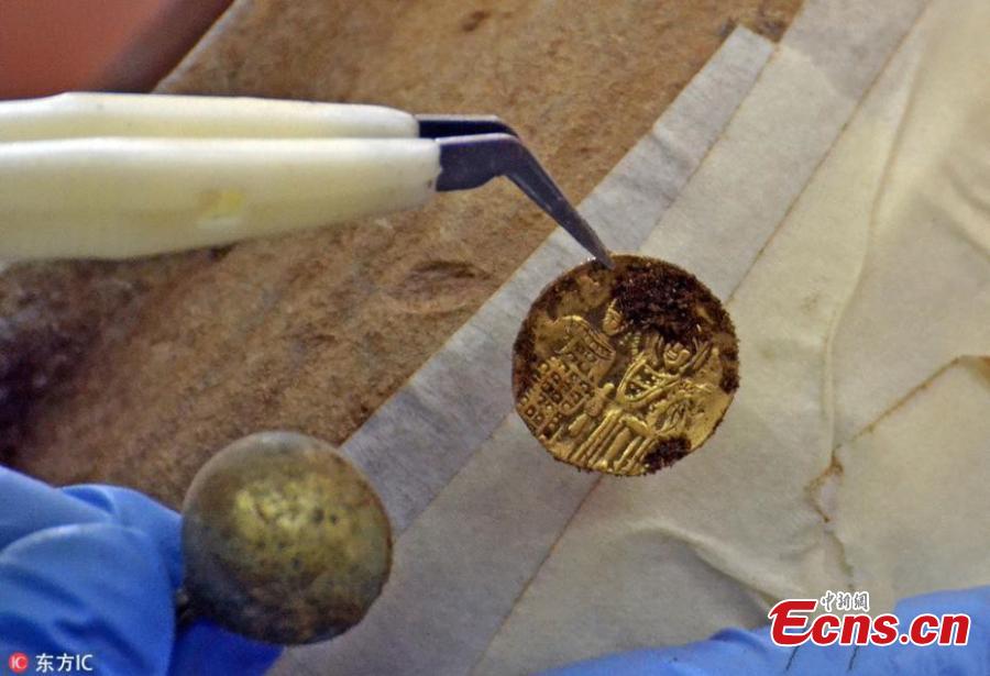 Photo released by the National History Museum in Bulgaria shows god and silver findings excavated in Kaliakra Fortress by archeologists on Aug. 15, 2018. The clay treasure pot contained 873 silver and 28 gold artifacts believed to have been looted by a Tatar (Mongol) leader in the 14th century. (Photo/IC)