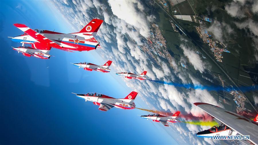 <?php echo strip_tags(addslashes(Red Falcon Air Demonstration Team performs during an activity of opening day at the Aviation University of Air Forces in Changchun, capital of northeast China's Jilin Province, Aug. 30, 2018. (Xinhua/Yang Pan))) ?>
