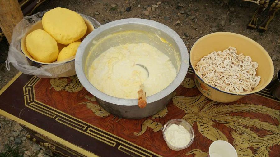Butter, yogurt and crispy milk curds are made from yak milk. (Photo/CGTN)