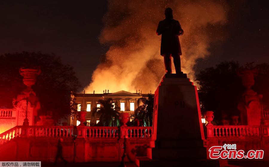Firefighters try to extinguish a fire at the National Museum of Brazil in Rio de Janeiro, Brazil September 2, 2018. (Photo/Agencies)

A massive fire raced through Brazil\'s 200-year-old National Museum in Rio de Janeiro on Sunday, probably destroying its collection of more than 20 million items, ranging from archeological finds to historical memorabilia. The destruction of the building was an \