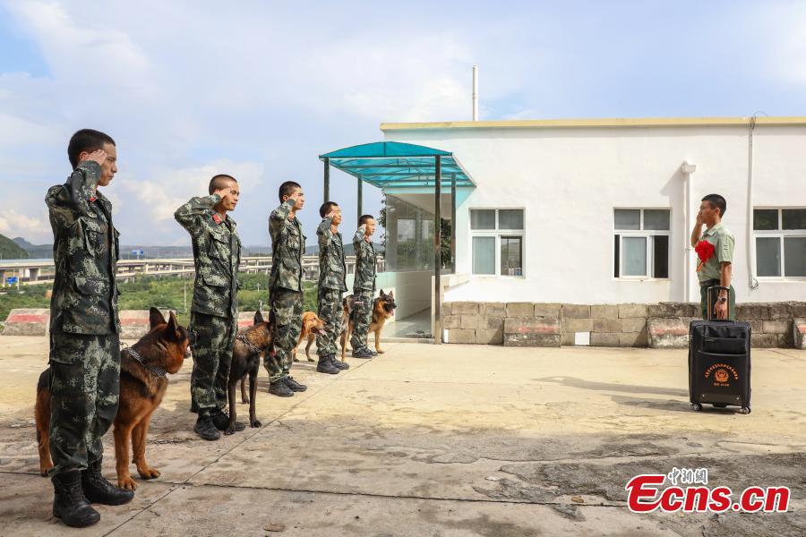 <?php echo strip_tags(addslashes(Armed police officer Han Menglin (R) says goodbye to his comrade-in-arms at a training base in Guizhou Province, Aug. 31, 2018. (Photo: China News Service/Qu Honglun))) ?>