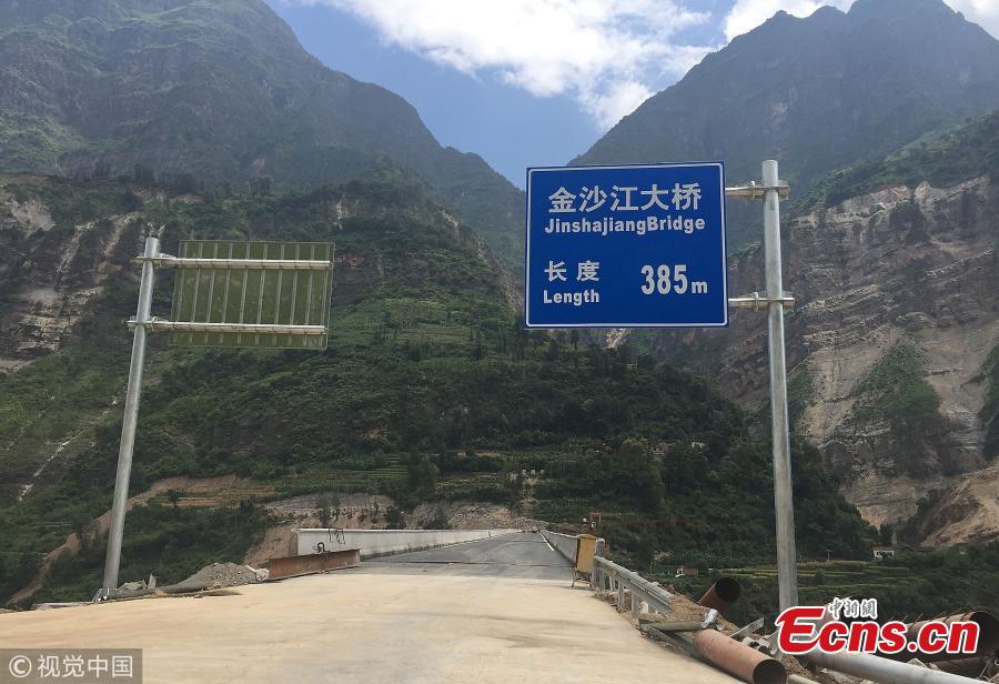 It’s goodbye dangerous, outdated ziplines and hello newly-built bridges for a river by a village in Liangshan Yi Autonomous Prefecture, Southwest China’s Sichuan Province, Sept. 1, 2018. The province has built 77 new bridges to replace ziplines ?steel cables the villagers hung from for a dangerous journey across the river. (Photo/VCG)