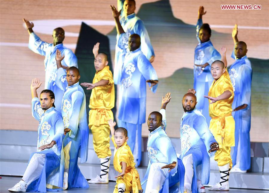 Chinese and foreign artists stage a Kung Fu performance after a banquet held to welcome guests attending the Beijing Summit of the Forum on China-Africa Cooperation (FOCAC) at the Great Hall of the People in Beijing, capital of China, Sept. 3, 2018. (Xinhua/Yan Yan)
