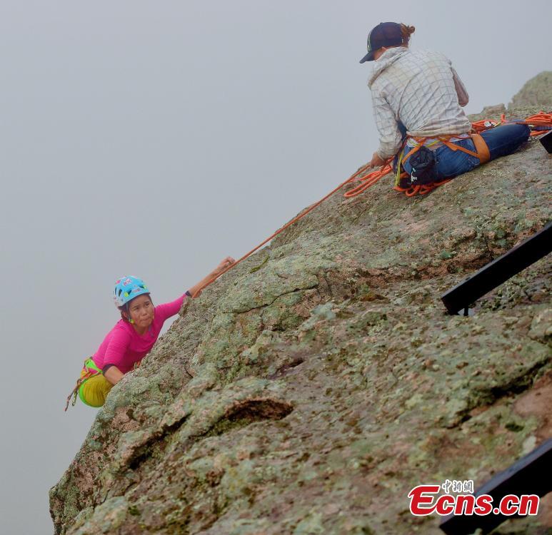 Participants compete in a rock-climbing contest, part of a sports festival in Oroqen Autonomous Banner, North China’s Inner Mongolia Autonomous Region, Sept. 3, 2018. (Photo: China News Service/Hou Yupeng)