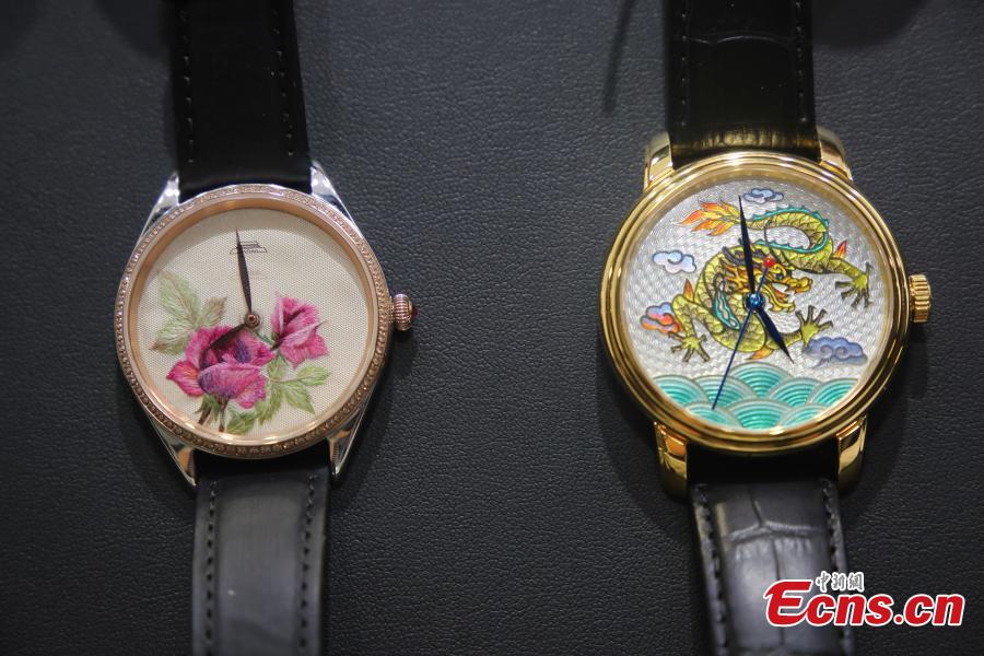 Watches that integrate elaborate Su embroidery and enamel craftsmanship are displayed at the 37th HKTDC Hong Kong Watch & Clock Fair at the Hong Kong Convention and Exhibition Centre, Sept. 4, 2018. The world’s largest watch fair includes quality timepieces from 830 exhibitors from 25 countries and regions. (Photo: China News Service/Xie Guanglei)