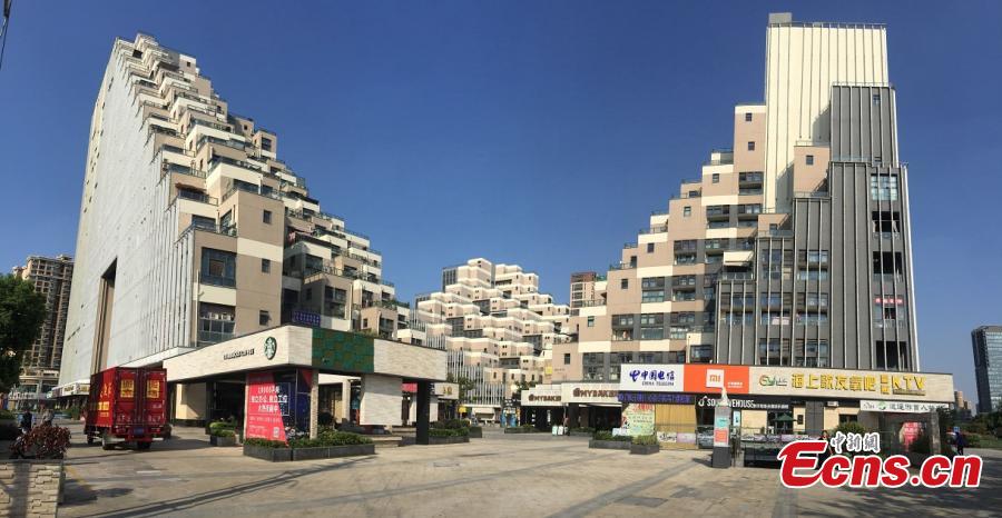 A building complex that looks like a pyramid in Kunshan City, East China’s Jiangsu Province, Sept. 5, 2018. Pictures of the complex, comprised of three buildings located on a mountain, went viral on the Internet due to its unique architectural appearance. The complex was put into use in 2013 and has a total floor area of 130,000 square meters. (Photo: China News Service/Huang Ying)