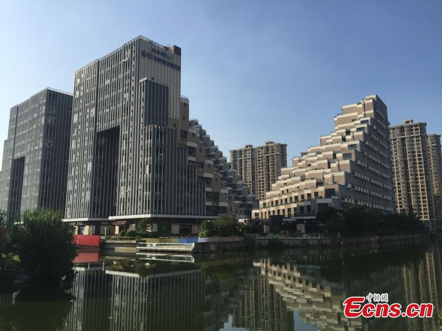 A building complex that looks like a pyramid in Kunshan City, East China’s Jiangsu Province, Sept. 5, 2018. Pictures of the complex, comprised of three buildings located on a mountain, went viral on the Internet due to its unique architectural appearance. The complex was put into use in 2013 and has a total floor area of 130,000 square meters. (Photo: China News Service/Huang Ying)