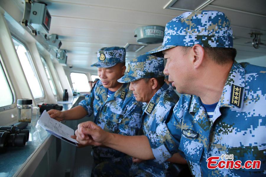 Chinese soldiers and officers work onboard Chinese frigate Huangshan during Exercise KAKADU 2018 at sea off the coast of Darwin, Australia, Sept. 6, 2018. The joint exercise was hosted by the Royal Australian Navy and supported by the Royal Australian Air Force. This year\'s event involves the participation of 27 countries, including China, Bangladesh, Canada, Chile, France, India, Indonesia, Japan, New Zealand, Philippines, Republic of Korea. (Photo: China News Service/Xu Guang)