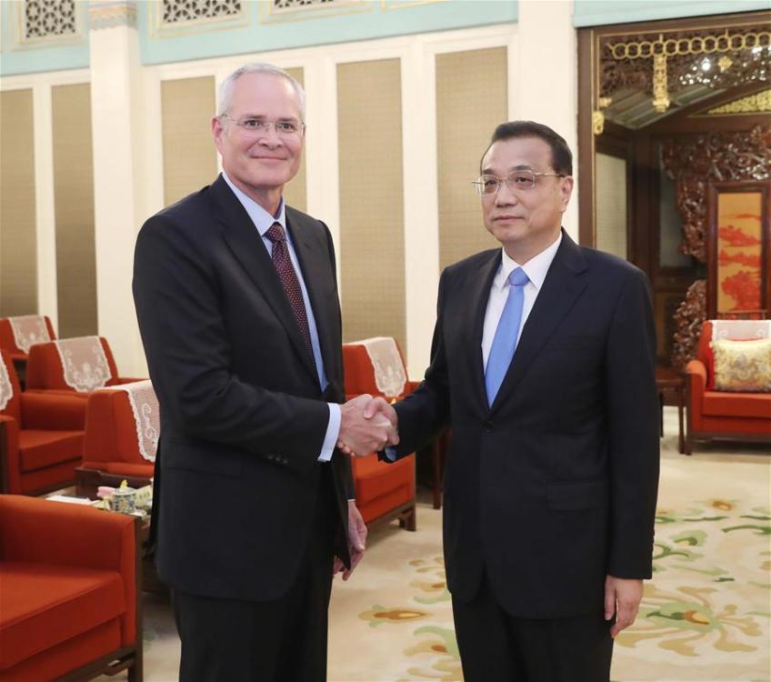 Chinese Premier Li Keqiang (R) meets with Darren Woods, ExxonMobil chairman and CEO, in Beijing, capital of China, Sept. 7, 2018. (Xinhua/Liu Weibing)
Chinese Premier Li Keqiang on Friday met with Darren Woods, ExxonMobil chairman and CEO.
The healthy development of China-U.S. two-way investment is not only beneficial to both sides but also contributes to the stable development of world economy and the growth of international trade, said Li, calling on all countries in the world to jointly safeguard trade and investment liberalization and facilitation.
Li said that China welcomes ExxonMobil to build a large-scale wholly-owned petrochemical project in China, expressing the hope that foreign companies, including ExxonMobil, seize the opportunity to cooperate with China to better achieve mutual benefits and win-win results in accordance with market rules and commercial principles.
Li said that the achievements of China\'s development over the past 40 years benefited from reform and opening up, and China will continue to follow this path.
The Chinese side will further relax market access, treat Chinese and foreign companies equally, better protect intellectual property rights, continuously optimize the business environment and provide more convenience for foreign companies to invest in China, in order for China to remain a hot investment destination for foreign companies, said Li.
The Chinese premier hoped that U.S. companies, including ExxonMobil, will actively expand their investment in China and provide an objective and fair voice to promote people to positively and rationally consider China\'s reform, opening up and development.
During Woods\' visit to China, ExxonMobil discussed with the Chinese side on building a wholly-owned petrochemical project worth 10 billion U.S. dollars in China\'s Guangdong Province.
Noting that ExxonMobil has a long cooperative relationship with China, Woods expressed the appreciation of China\'s recent measures on expanding opening up, optimizing the business environment and protecting intellectual property rights.
Woods said such measures by China will not only help China achieve its development goals but will also provide a wide range of opportunities for enterprises such as ExxonMobil to conduct cooperation in China.
Woods said that many of ExxonMobil\'s development goals fit with the China\'s development plan, and he is confident in the success of relevant cooperation projects.
ExxonMobil is willing to use world-class technology to help China\'s manufacturing and carry out long-term cooperation with China.