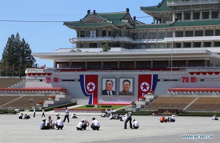 Photo taken on Sept. 8, 2018 shows people taking part in cleaning work at Kim Il Sung Square in Pyongyang, capital of the Democratic People\'s Republic of Korea (DPRK). Sept. 9, 2018 marks the 70th anniversary of the founding of the DPRK. (Xinhua/Jiang Yaping)
