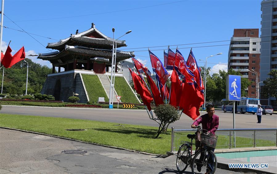 Photo taken on Sept. 8, 2018 shows an avenue decorated with national flags in Pyongyang, capital of the Democratic People\'s Republic of Korea (DPRK). Sept. 9, 2018 marks the 70th anniversary of the founding of the DPRK. (Xinhua/Jiang Yaping)