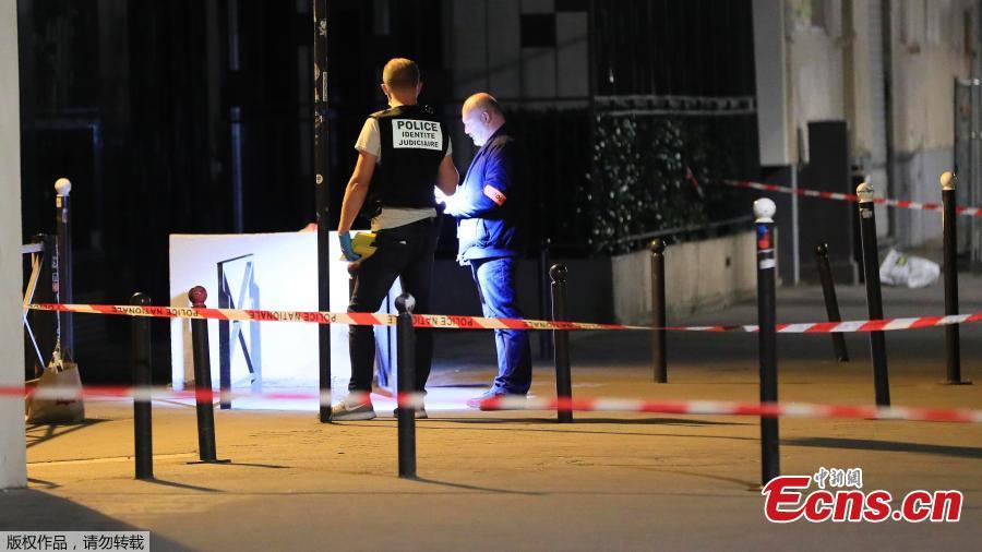 Police investigators work on the scene after seven people were wounded in knife attack downtown Paris, France, Sept. 10, 2018. Seven people including two British tourists were wounded Sunday in Paris after they were attacked by a man armed with a knife and an iron bar, according to police and other sources. (Photo/Agencies)