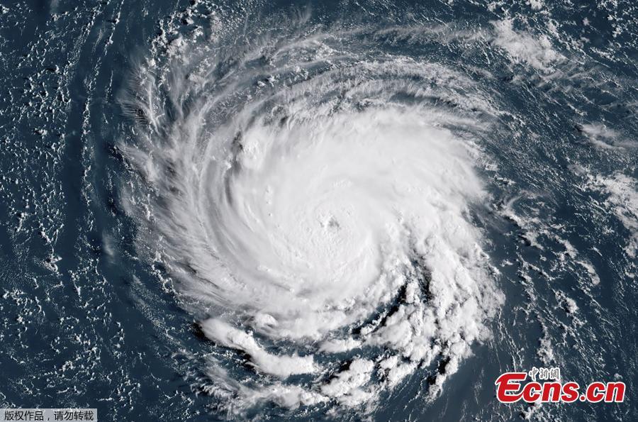 This satellite image taken on September 10, 2018, shows Hurricane Florence off the US east coast in the Atantic Ocean. Hurricane Florence is expected to become a dangerous \