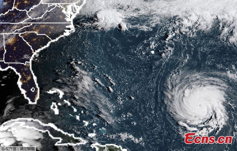 This satellite image taken on September 10, 2018, shows Hurricane Florence off the US east coast in the Atantic Ocean. Hurricane Florence is expected to become a dangerous \