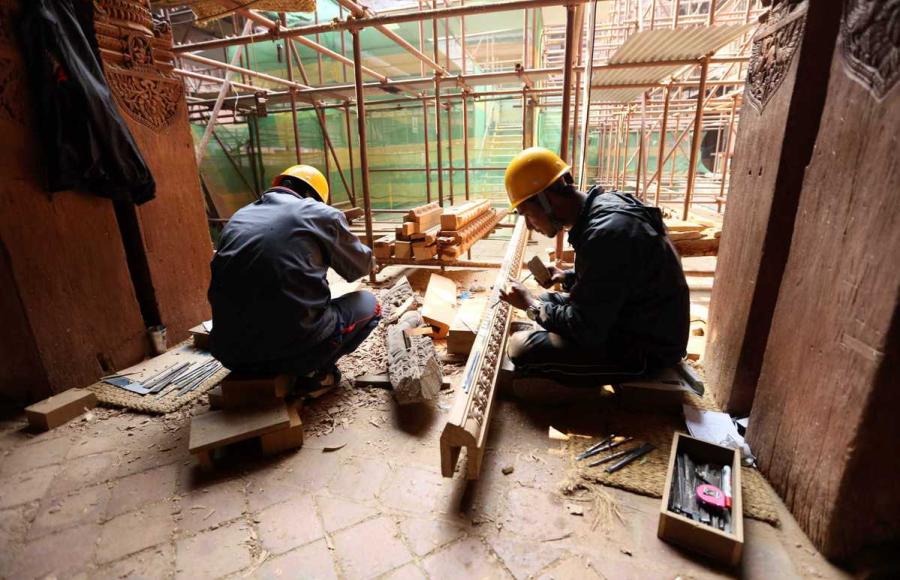 Chinese and Nepalese workers take part in restoration work at Kathmandu Durbar Square in Nepal. (Photo/China Daily)

Chain of programs

Xie Bing, director of the International Communication Department at the State Administration of Cultural Heritage, said China has conducted eight foreign aid programs for the preservation of cultural relics in six countries, and 15 joint archaeological programs in 12 countries by the end of last year.

\