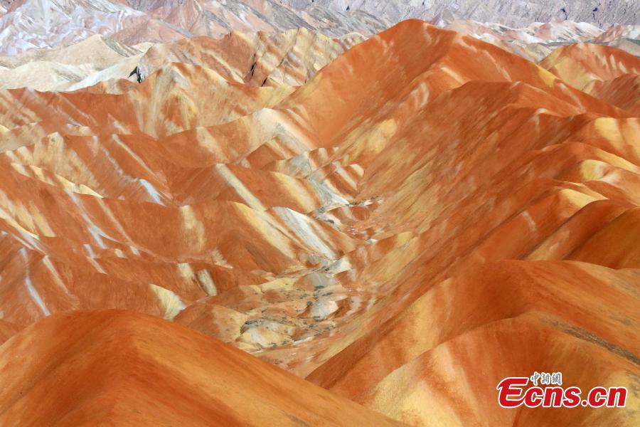 The colorful Danxia landform group, located in Zhangye City, Northwest China’s Gansu Province. At an average elevation of 1850 meters, the Danxia landform stretches east to west for 45 kilometers and north to south for 10 kilometers. More than a famous tourist attraction, the Danxia landform has been featured in a number of movies. (Photo: China News Service/Ren Haixia)