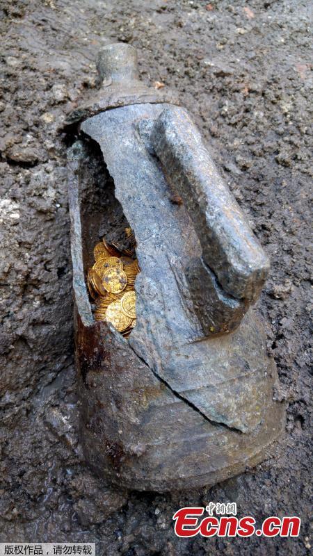 About 300 Roman-era gold coins were unearthed beneath what once was an Italian theater. The rare treasure was found by construction workers building an apartment complex at the previous site of the historic Cressoni Theater in northern Italy, which closed in the 1990s. What appears to be a soapstone vase or jar held the coins, believed to be from 474 B.C. (Photo/Agencies)
