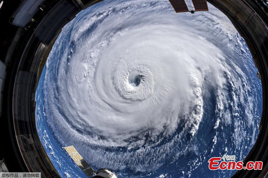 Hurricane Florence gains strength in the Atlantic Ocean as it moves west, seen from the International Space Station. Hurricane Florence, growing in size and intensity, crept closer to the U.S. East Coast on Wednesday as disaster mobilizations expanded south from the Carolinas into Georgia to counter the threat of fierce winds, deadly high seas and calamitous floods. (Photo/Agencies)