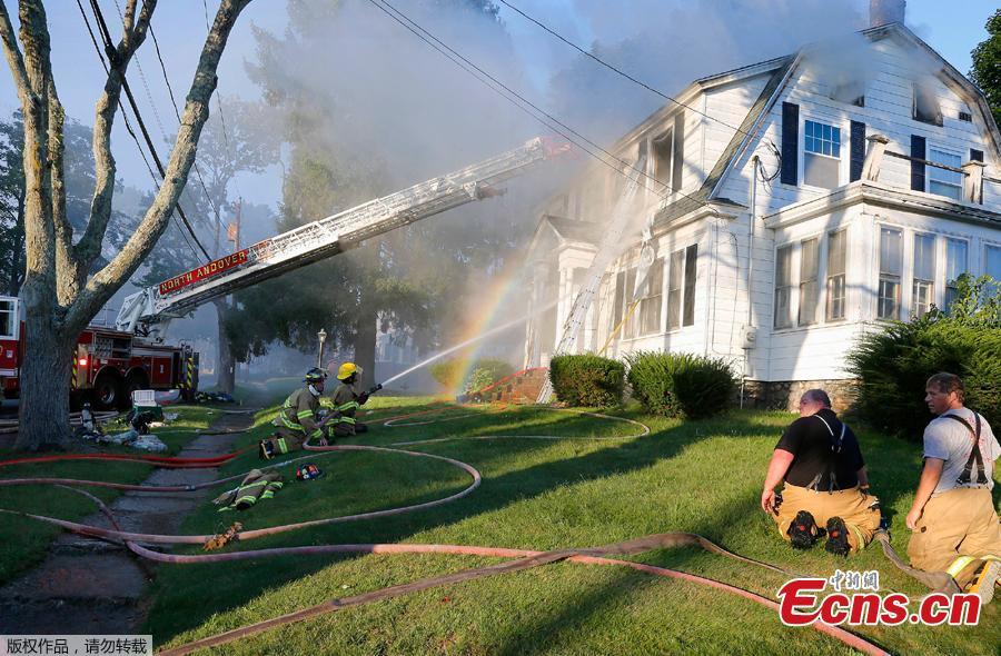 <?php echo strip_tags(addslashes(Firefighters battle a house fire, Thursday, Sept. 13, 2018, on Herrick Road in North Andover, Mass., one of multiple emergency crews responding to a series of gas explosions and fires triggered by a problem with a gas line that feeds homes in several communities north of Boston. (Photo/Agencies))) ?>