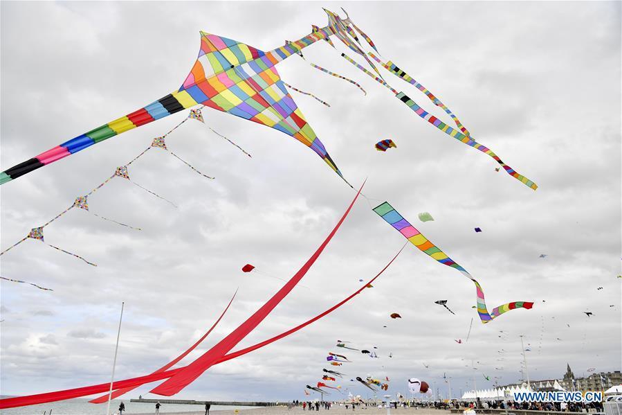 Kites fly over Dieppe, France, on Sept. 14, 2018. The 20th Dieppe International Kite Festival is held here from Sept. 8 to Sept. 16, attracting over 1,000 kite enthusiasts from 34 countries and regions. (Xinhua/Chen Yichen)