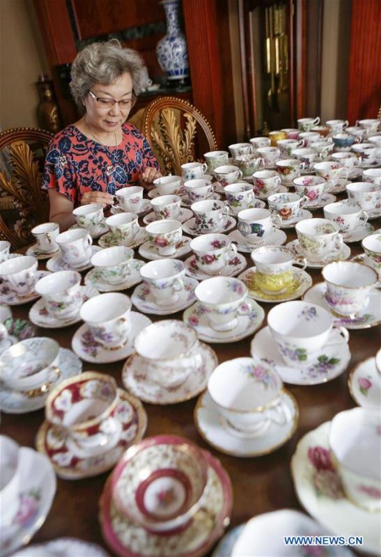 <?php echo strip_tags(addslashes(Teacup collector June Gao displays part of her teacup collections inside her house in Vancouver, Canada, Sept. 13, 2018. (Xinhua/Liang Sen))) ?>